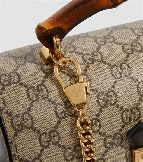 gucci padlock medium gg supreme shoulder bag|how to open Gucci bag.